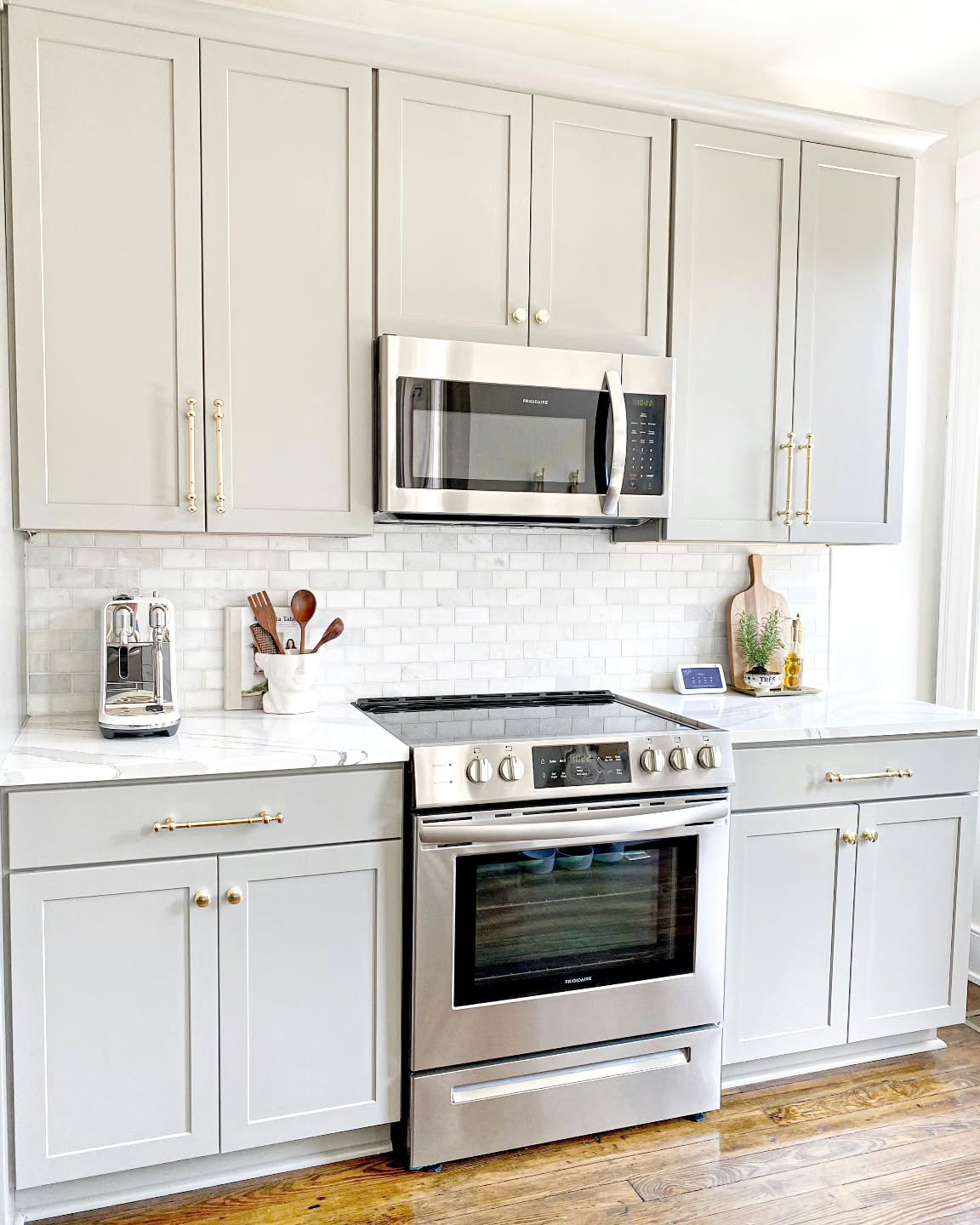 Neutral shaker kitchen cabinets by interior designer in MetroWest Boston